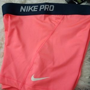 Neon orange Nike Pros